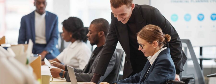 Businesswoman reviewing data with a colleague in an office setting