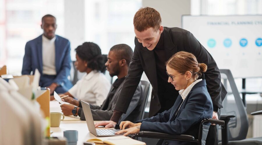 Businesswoman reviewing data with a colleague in an office setting